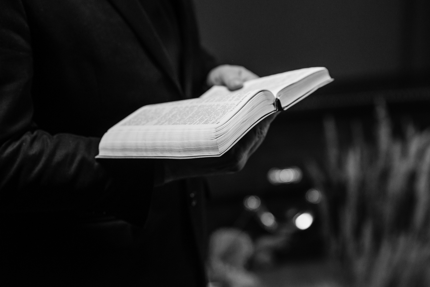 A Person Holding a Bible